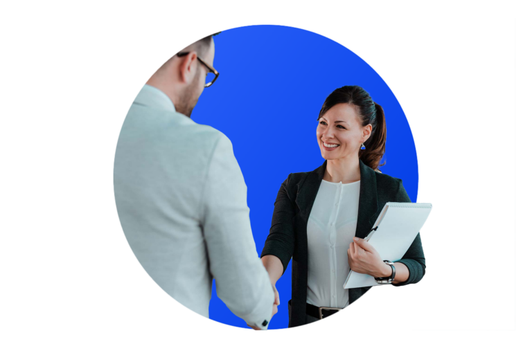 2 people shaking hands holding a notebook with a blue circle behind them