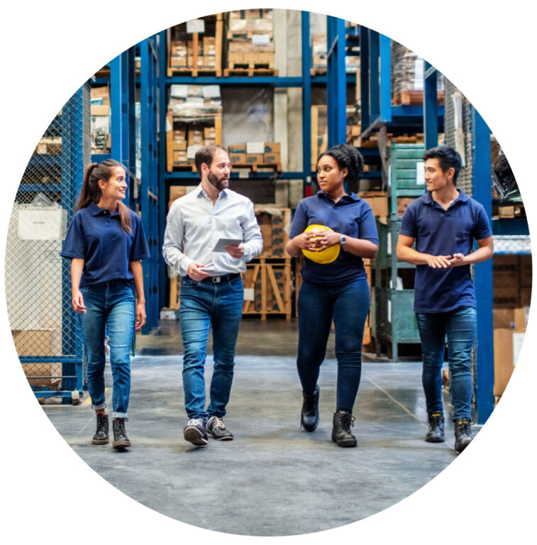 group walking in manufacturing plant